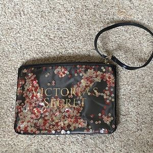 VS sequin wristlet